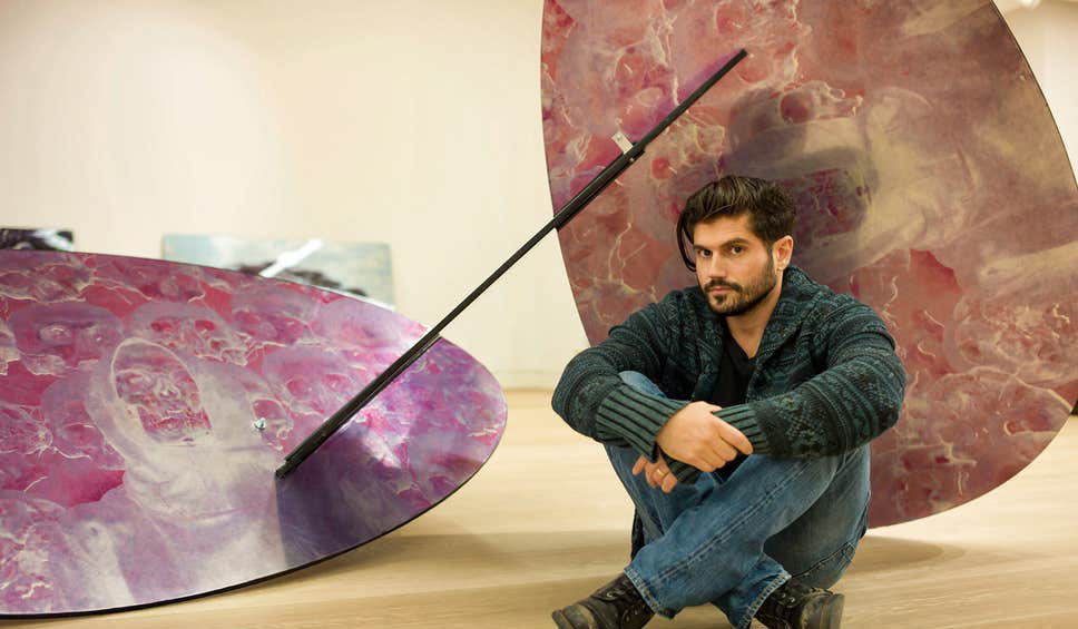Andrew Levitas with sculpture